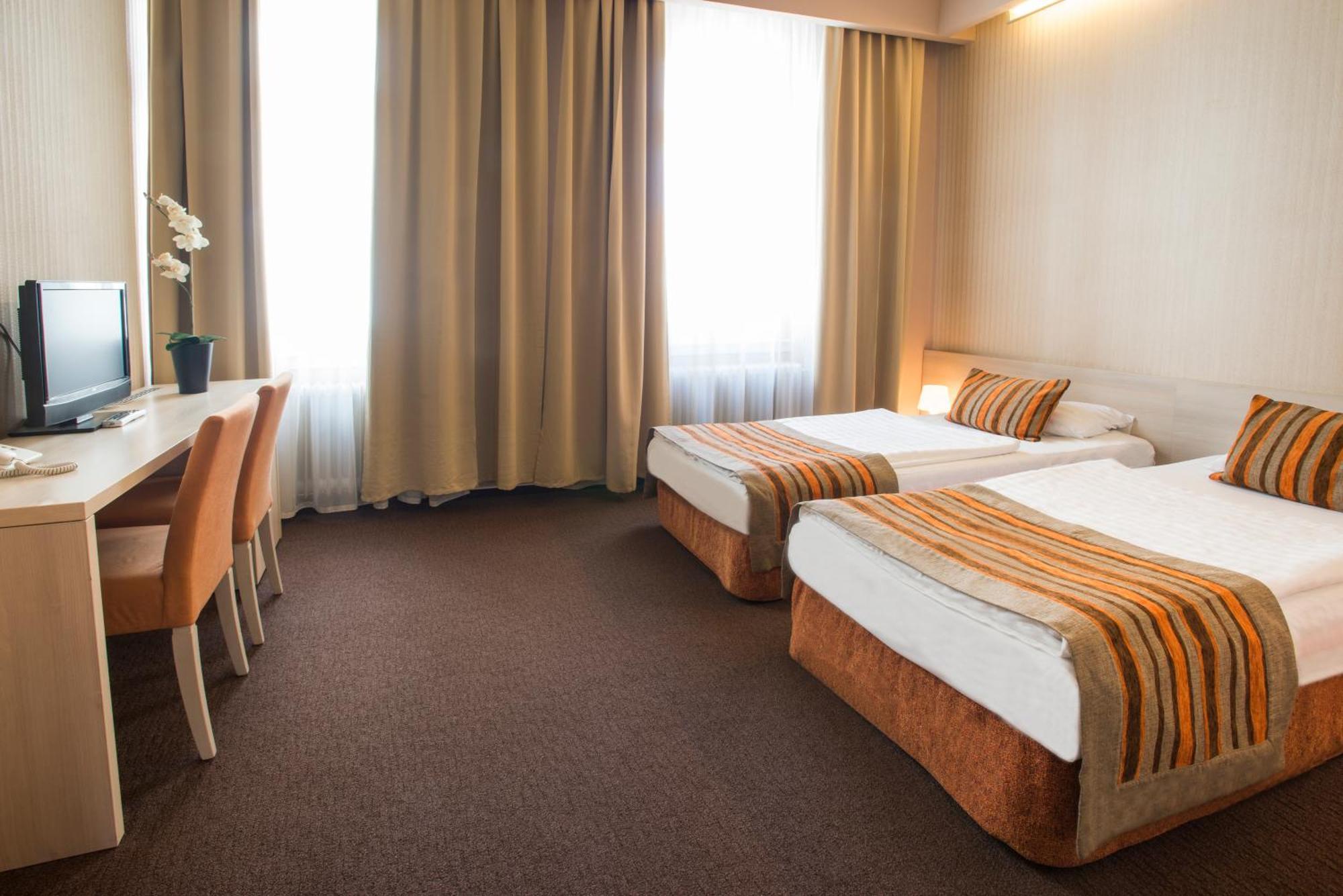 Doppel- oder Zweibettzimmer
